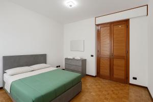 Postel nebo postele na pokoji v ubytování Ampia dimora per cinque persone
