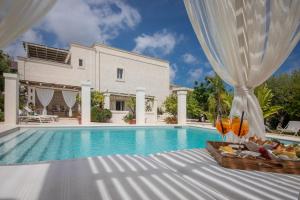 Bazén v ubytování Masseriola Antiche Fogge by Apulia Hospitality nebo v jeho okolí