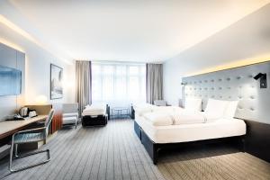 Postel nebo postele na pokoji v ubytování Premier Inn Köln City Mediapark