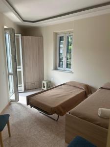 A bed or beds in a room at Vittorio Veneto Accomodation - Tropea city center