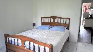 Letto o letti in una camera di Le Gîte du Lac d'Hostens