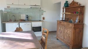 Cucina o angolo cottura di Le Gîte du Lac d'Hostens