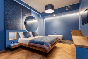 Postel nebo postele na pokoji v ubytování Le Texture Premium Rooms Duomo-Cordusio