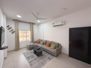 أجنحة هومينج ــ Homing Suites的电视和/或娱乐中心