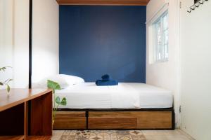 Postelja oz. postelje v sobi nastanitve Nao Hostels Playa Venao