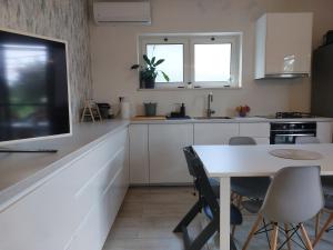 Fotografie z fotogalerie ubytování Apartment Oliva Garden v Podgoře + 8 fotografií