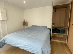 Postel nebo postele na pokoji v ubytování Pixy studio in a central and quiet area near Basel