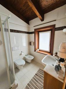 Kúpeľňa v ubytovaní Hotel Angelica