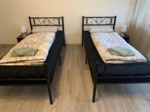 Postel nebo postele na pokoji v ubytování Apartment Aqualonnähe