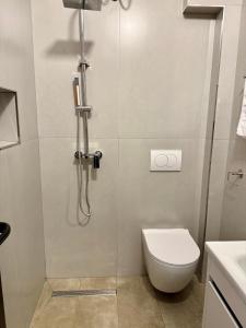 Koupelna v ubytování TOT Apartment