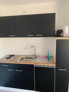 Kuchyň nebo kuchyňský kout v ubytování Apartment Aqualonnähe
