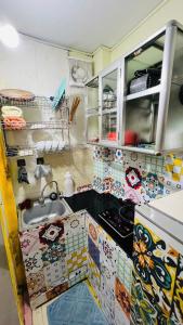 O bucătărie sau chicinetă la Studio Bông Hồng đỏ