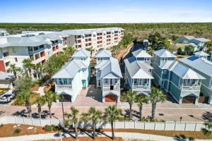 an aerial view of a resort with palm trees at Sol Shine Gulf-View Retreat Steps from the Sand in Mexico Beach