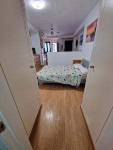 Posteľ alebo postele v izbe v ubytovaní Castilla del Patrocinio, Coqueto apartamento de 1Dormitorio