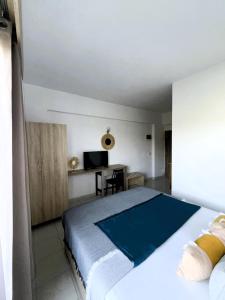 Postel nebo postele na pokoji v ubytování Sotirakis Hotel