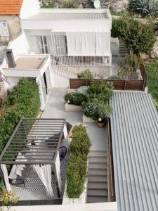 Vonkajšia záhrada v ubytovaní Apartment Mr Bellina