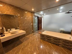 Et badeværelse på Ngọc Trai 76 FLC Sầm Sơn