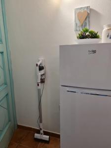 A kitchen or kitchenette at La Casa di Orimari