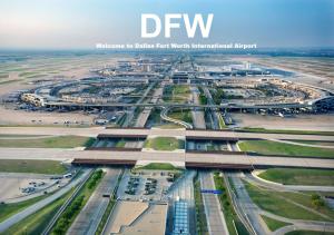 an aerial view of a large airport with cars at Quality Inn & Suites Irving DFW Airport South in Irving