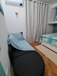 A bed or beds in a room at La Casa di Orimari