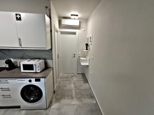 Nhà bếp/bếp nhỏ tại Poseidon Apartments