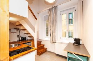 Kuchyňa alebo kuchynka v ubytovaní BudaFlats Apartments