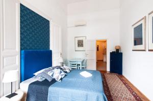 Posteľ alebo postele v izbe v ubytovaní BudaFlats Apartments