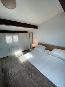 Postel nebo postele na pokoji v ubytování coccon 7