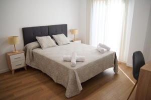 Ένα ή περισσότερα κρεβάτια σε δωμάτιο στο Casa Serret