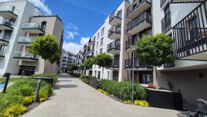 an empty street in an apartment building at Essence Lux Apartment, free parking, self check-in 24h in Poznań