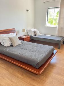 a bedroom with two beds and a window at Silver Globe in Albufeira +87 photos