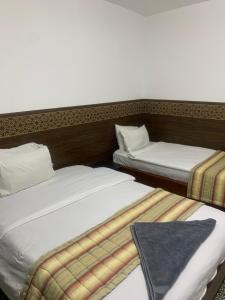 Cama o camas de una habitación en Z Pyramids Inn
