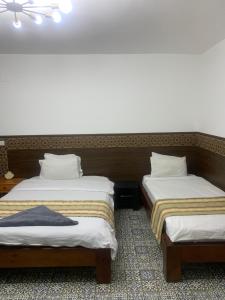 Cama o camas de una habitación en Z Pyramids Inn