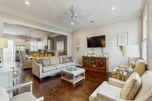 a living room with a couch and a table at Price Street Place in Savannah