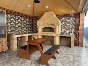a model of a kitchen with a table and an oven at Burj Sheki in Sheki +12 photos