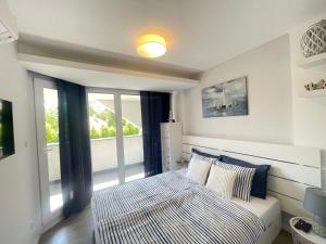Ảnh trong thư viện ảnh của Lake and Pool Apartman Balatonszemes ở Balatonszemes