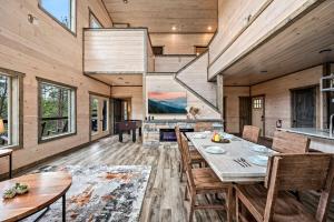 a dining room with a table and chairs at Mountain Bliss by Avada Properties in Sevierville
