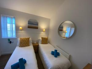 Ένα ή περισσότερα κρεβάτια σε δωμάτιο στο Seafolly Beach House The Bay Filey Step Free Accommodation Private Offstreet Parking