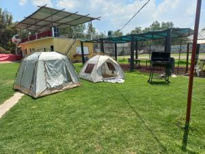 O grădină în afara RV Trailer park sun set teotihuacan