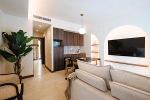 Kuchyň nebo kuchyňský kout v ubytování Apartamentos La Vistosona