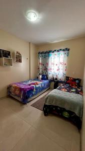 Postel nebo postele na pokoji v ubytování Apartamento completo para Cop30 - CENTRO DE BELÉM - Edifício Saint Germain- Travessa 14 de abril 1755 + 27 fotografií