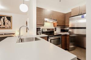 Kuchyň nebo kuchyňský kout v ubytování Escapade Chic au Vieux-Port