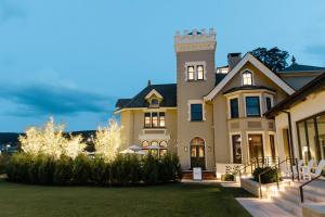 a large house with a lawn in front of it at Wilbur Mansion in Bethlehem