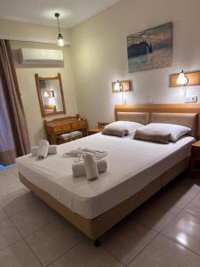 Postel nebo postele na pokoji v ubytování Paradise Hotel