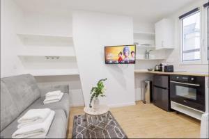 Køkken eller tekøkken på Pleasant Studio -2P- Sacré Coeur