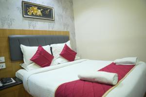 Postel nebo postele na pokoji v ubytování KVP GOLDEN INN