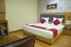 Postel nebo postele na pokoji v ubytování KVP GOLDEN INN