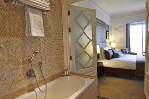 Postel nebo postele na pokoji v ubytování Villa Rosa Kempinski