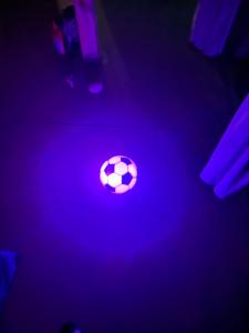 a soccer ball lit up in a dark room at Apartament Willa Dom wakacyjny Agroturystyka Zacisze11 Idealny dla rodzin z dziećmi Holiday Home Vacation House",Cały dom na wyłączność in Węgorzyn