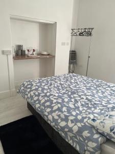 En eller flere senge i et værelse på Santel